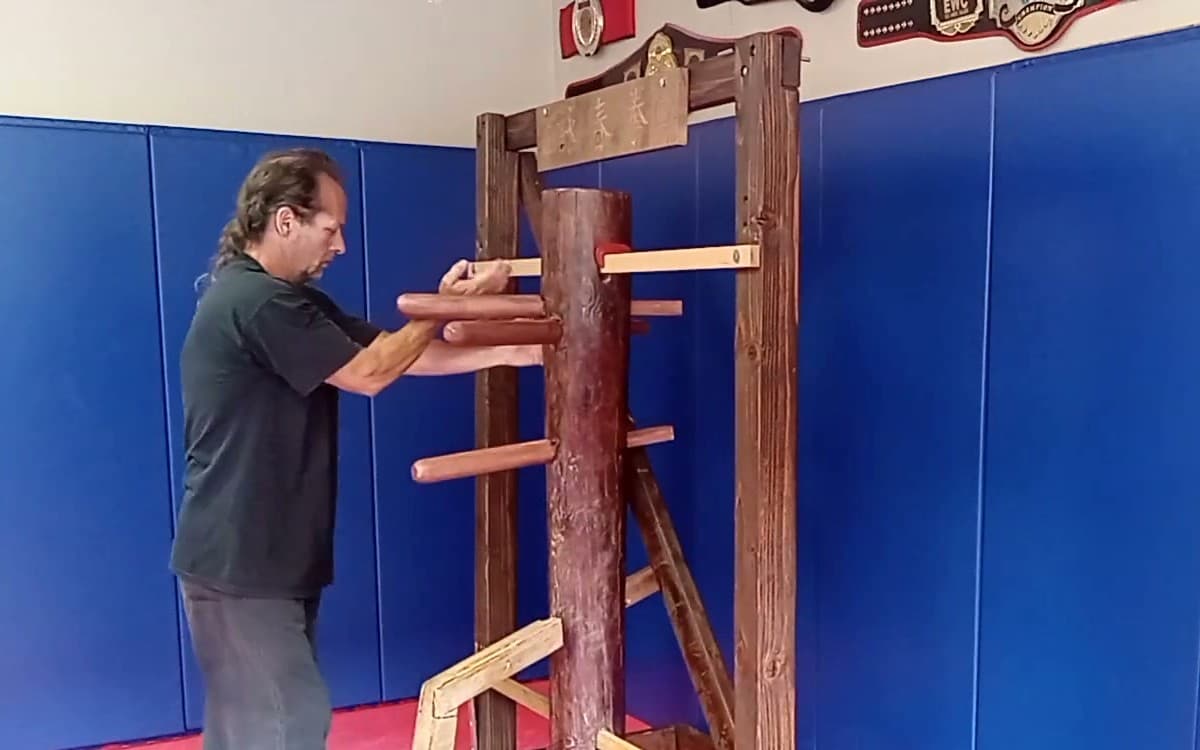 Sifu Kristian Gordon working the wooden dummy in the Wing Chun class