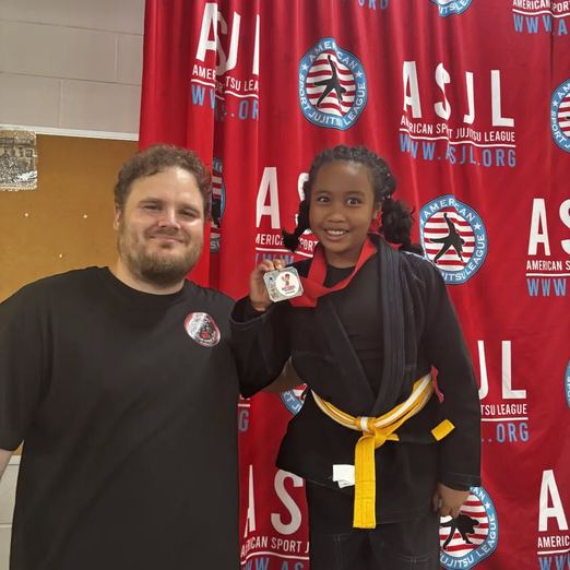 Youth competitor with medal at ASJL Nationals